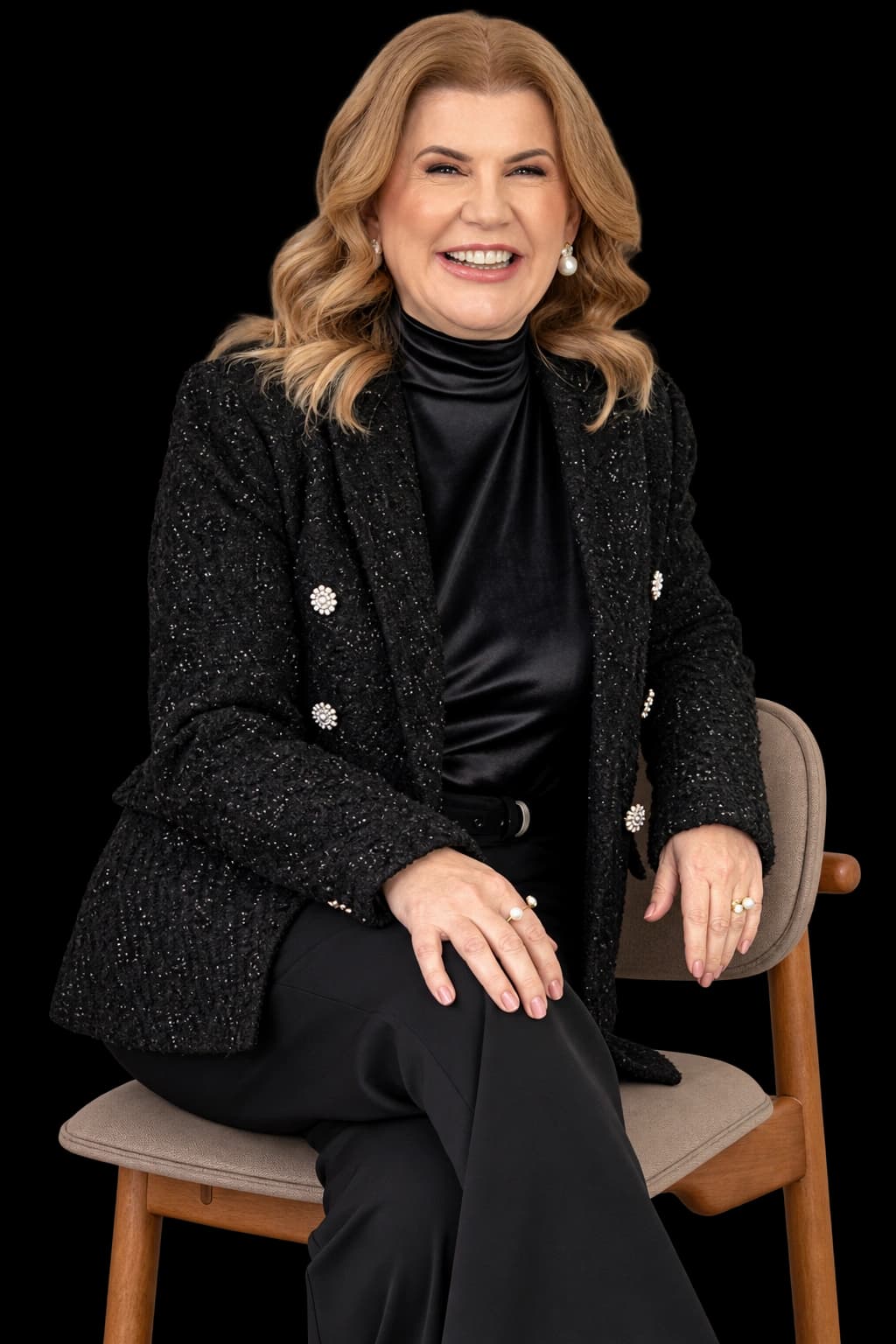 Dra. Audrey Lonni sentada em uma cadeira
